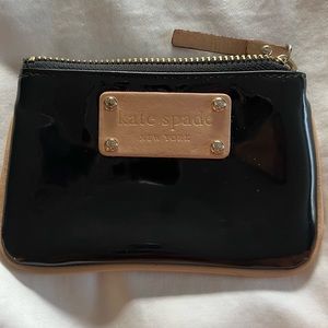 Kate spade coin purse - shiny faux leather, tan zipper pull and plaque.